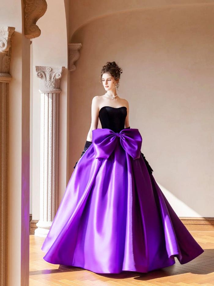 PURPLE AND THE BODICE IS BLACK