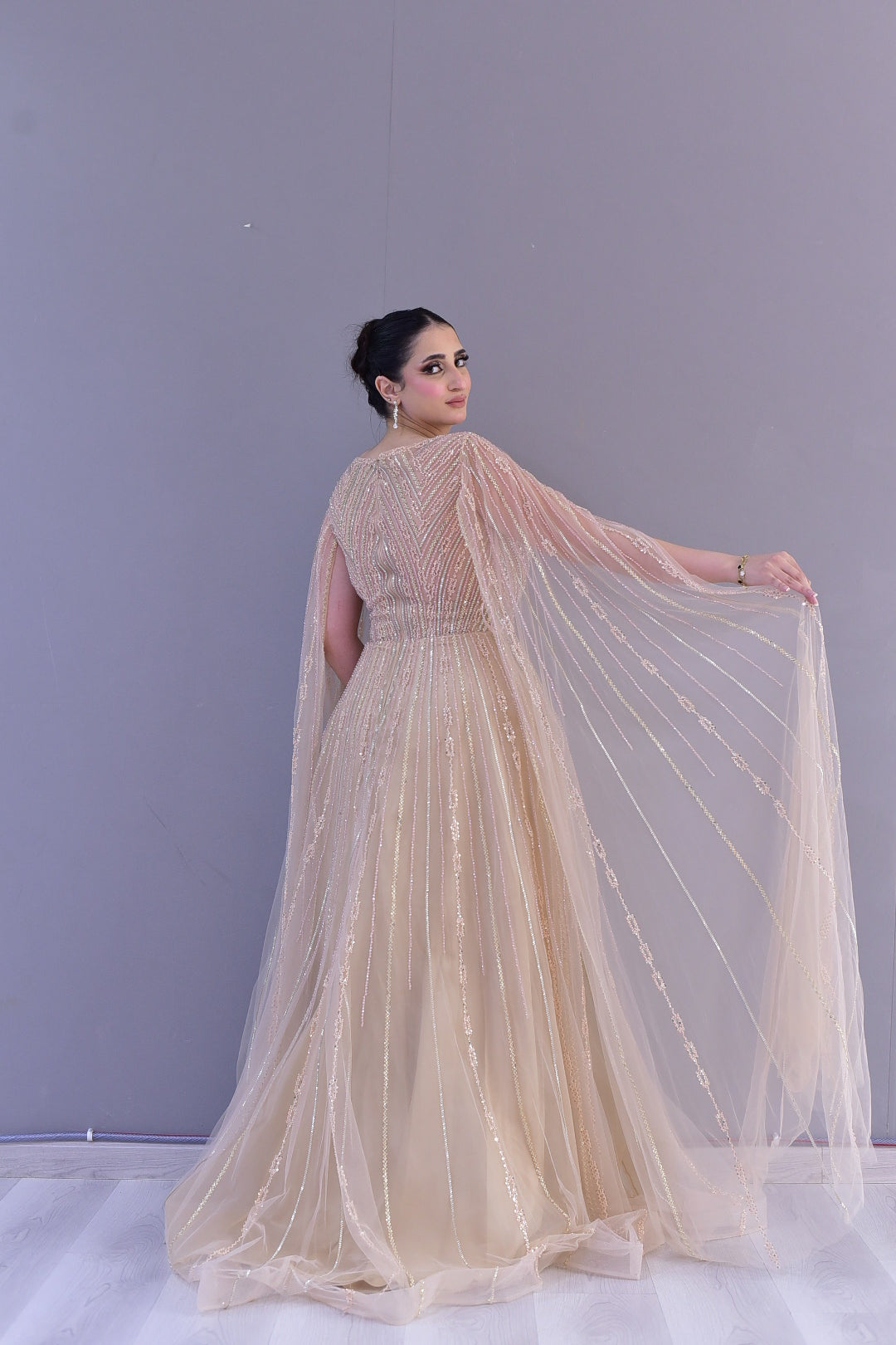 Champagne Embellished Cape Gown – Elegant Evening